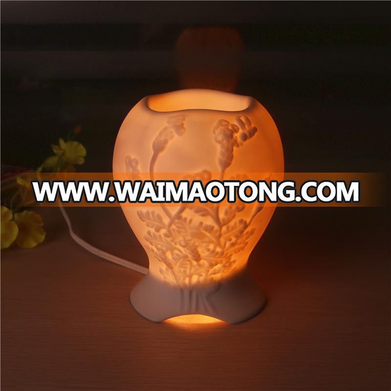 Factory price white color modern ceramic electric aroma oil burner for home decorative